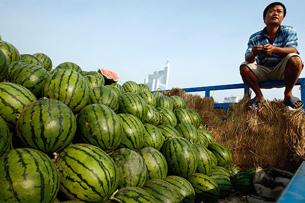 기사와 직접 관련 없는 자료사진 : 수박을 파는 중국 농민 | TEH ENG KOON/AFP via Getty Images=연합