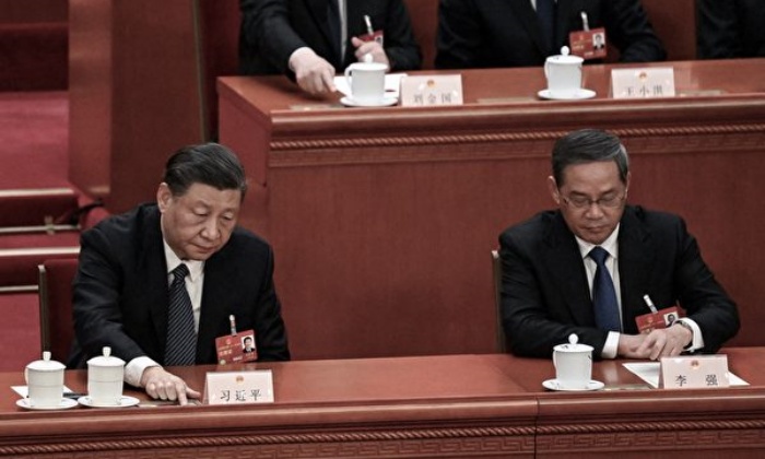 3월 12일 열린 양회에 참석한 시진핑(習近平) 중국 공산당 총서기(왼쪽)와 리창(李强) 총리. | NOEL CELIS/AFP via Getty Images