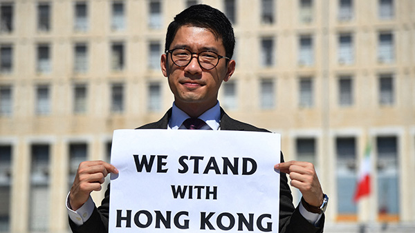 2020년 6월 30일 중국 당국의 홍콩에서 국안법을 시행 이후 홍콩에서 탈출한 홍콩 범민주정당 데모시스토 소속 민주운동가 나탄 로. | TIZIANA FABI/AFP via Getty Images=연합 