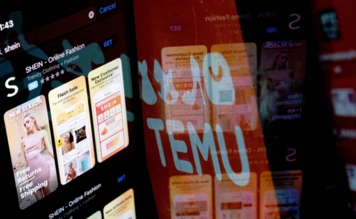 중국 초저가 쇼핑 앱 '테무(Temu)'와 패스트패션 앱 '쉬인(Shein)'의 로고가 스마트폰에 보인다. | Stefani Reynolds/AFP via Getty Images/연합뉴스