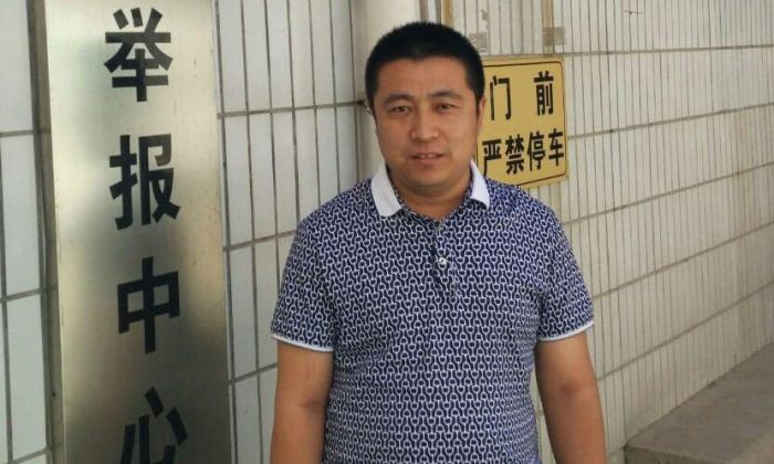Ren Quanniu in an undated photograph outside an official building. (Weibo.com)